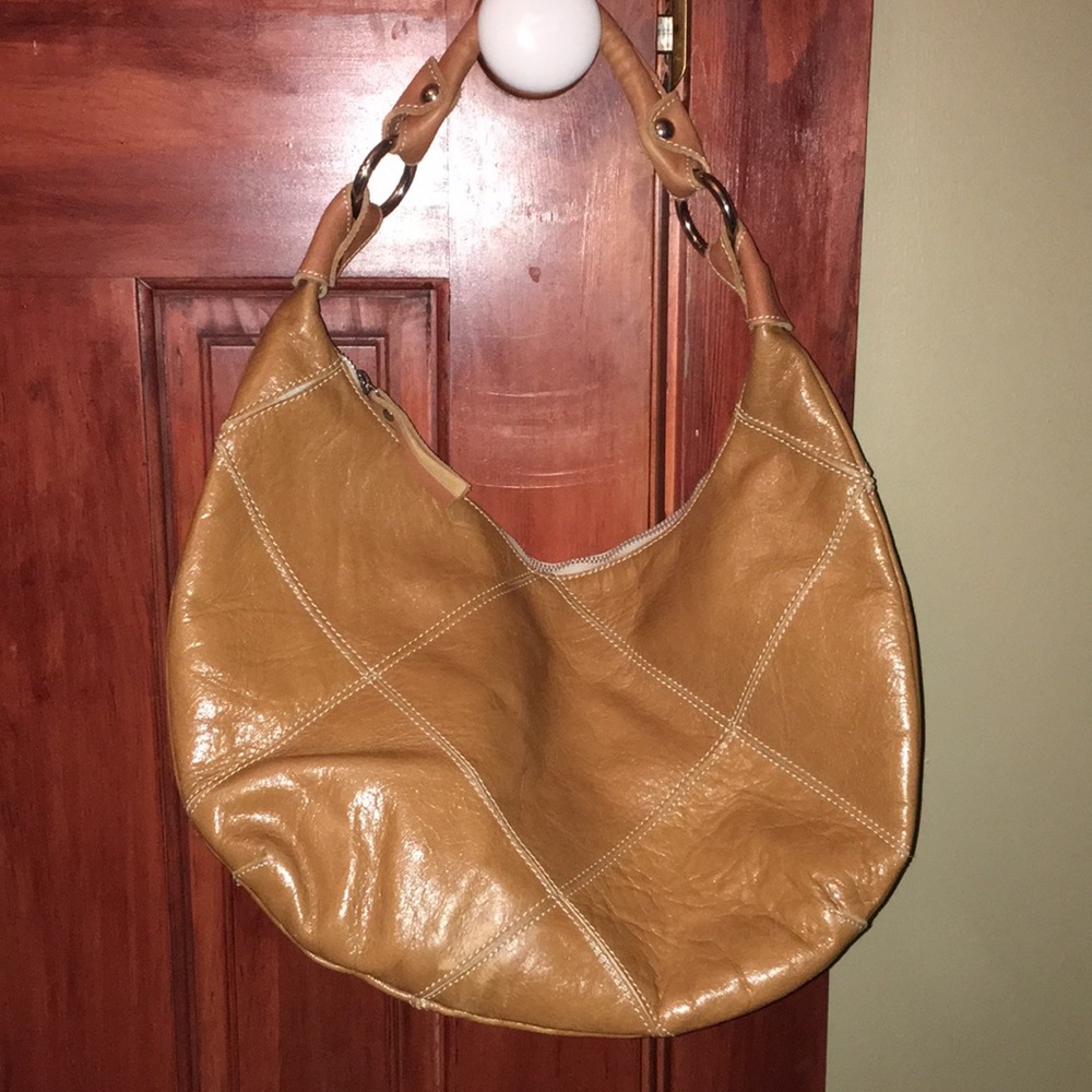 Hardly used Innue genuine leather bag